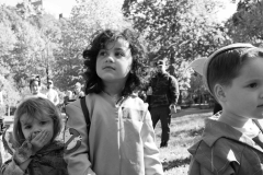 Three children in costume stand at the annual Come as You Art event on the Karl Stirner Arts Trail.