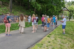 Group in front of Black Lives Matter mural