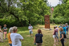 Jim and group by Upriver sculpture